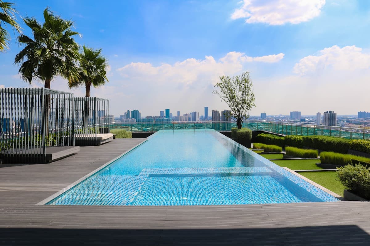 AI-generated 3D pool render showing a luxury backyard design